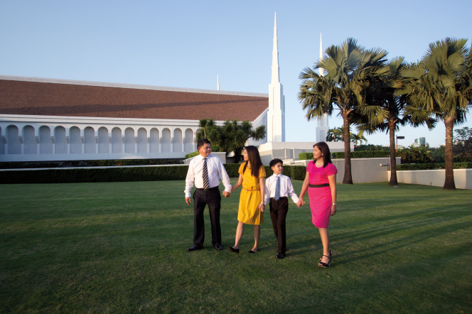 LDS family walking outside the temple