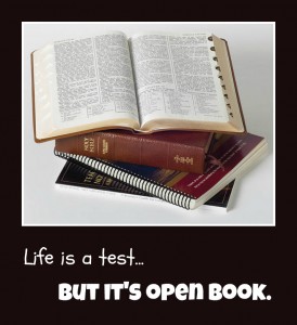 "Life is a test...but it's open book."; a photo of Mormon study materials, including the scriptures, stacked up with the top set of scriptures opened up.