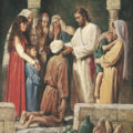 Jesus Christ healing a blind man.