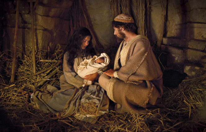 Mary, Joseph and the baby Jesus. Jesus Christ is the Light of the World.